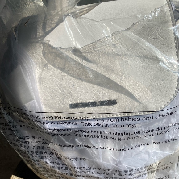 Micheal Kors Abbey Medium Perforated Backpack - Picture 2 of 8